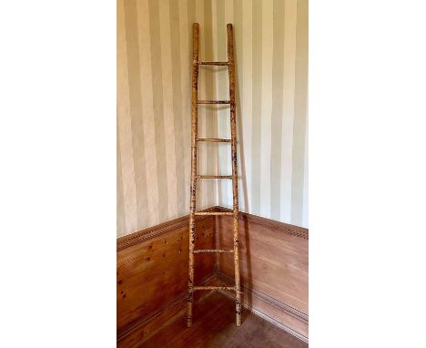 Early 20th century Japanese bamboo ladder with seven rungs, 245cm highSound original condition with some loose bindings and s