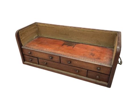 Early Victorian mahogany travelling clerk's desk, with three quarter gallery book trough, five drawer below, the lower left f