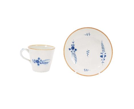 A Worcester coffee cup and saucer, circa 1780, the cup of tapered form, painted in underglaze blue in the French style with s