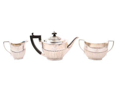 Victorian three piece tea set, comprising teapot of half fluted form, with hinged domed cover and angular ebony handle, on an