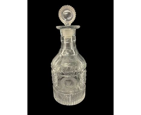 A George III cut glass decanter with armorial crest, 27.5cm high