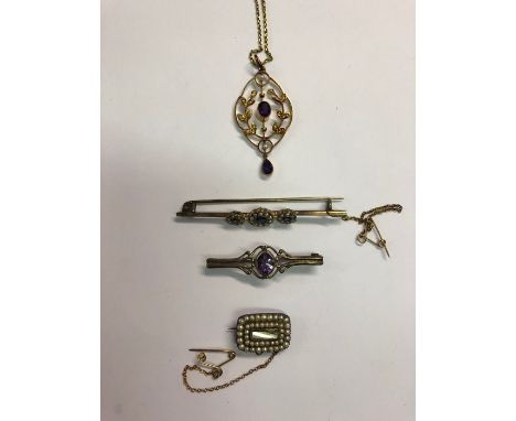 A collection of antique jewellery including an Art Nouveau scrollwork pendant set amethyst and seed pearls on chain; a pearl 