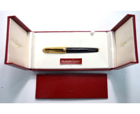A Cartier Pasha de Cartier, black fountain pen with gilt metal reeded cap, in fitted box - unusedGood condition