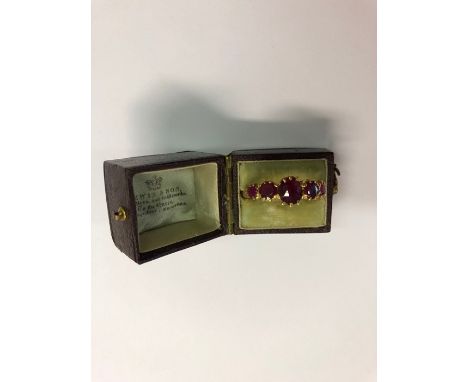 An antique five stone graduated ruby ring, yellow gold claw set, size P, approx 5.2g all in