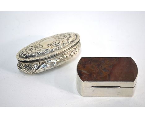 A late Victorian embossed silver elliptical snuff box, Deakin &amp; Francis, Birmingham 1895, to/w an unmarked Continental wh