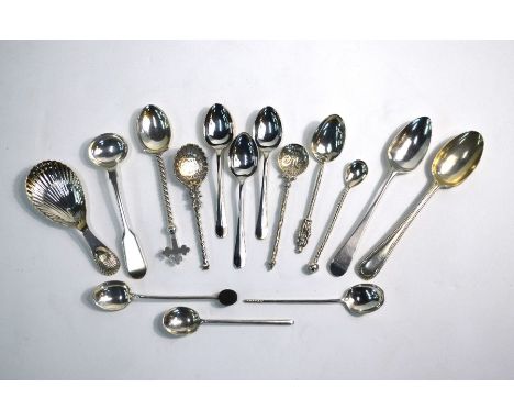 A silver caddy spoon with shell bowl and finials, London 1968, to/w various other silver and continental white metal spoons