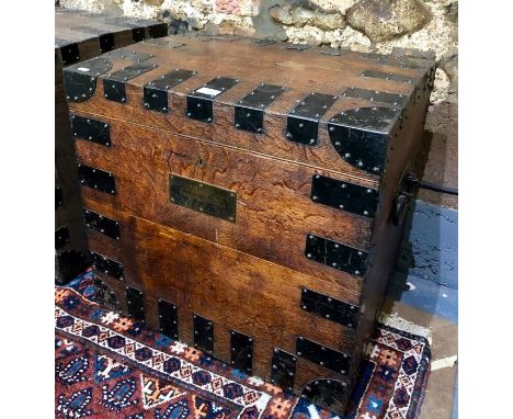 R &amp; S Garrard &amp; Co, London, an iron bound oak silver trunk with heavy duty carrying handles, with engraved makers pla