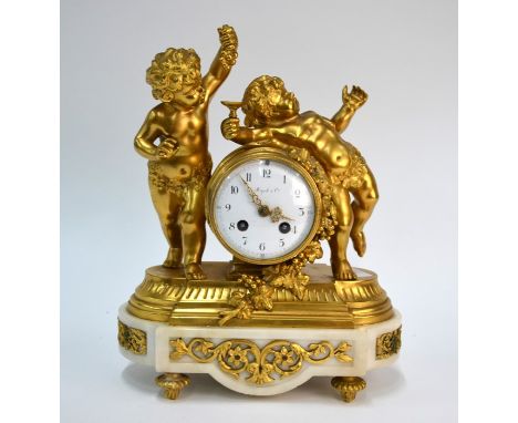 A good 19th century Louis XVI style ormolu and white marble mantel clock, the two train 8-day drum movement no. 2386, mounted