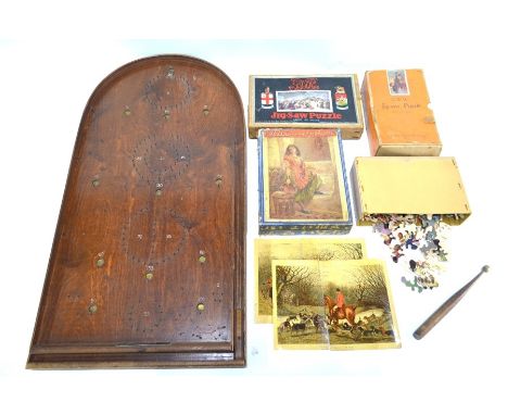 A Chad Valley boxed wooden jigsaw puzzle GWR poster of Piccadilly Circus and another Chad Valley wooden jigsaw, Paddington St