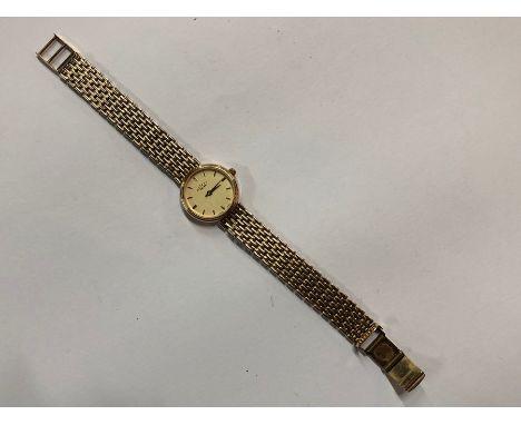 A lady's 9ct Rotary wristwatch with champagne dial and brick-link bracelet strap, 19.6 g gross weight