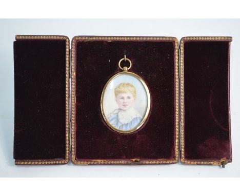 A late Victorian oval portrait miniature on ivory of a young boy, in glazed gilt pendant frame, mounted in a velvet-lined lea