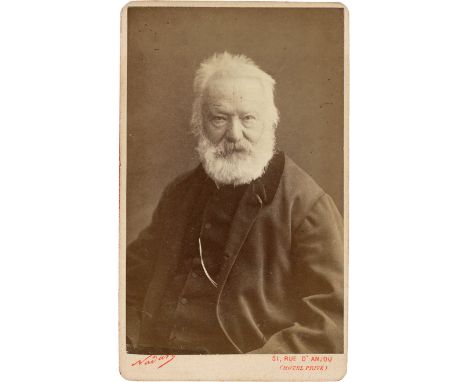 Nadar -- Portrait of the writer Victor Hugo (1802-1885). Circa 1878. Albumen print. 10,5 x 6,2 cm. Mounted on photographer's 