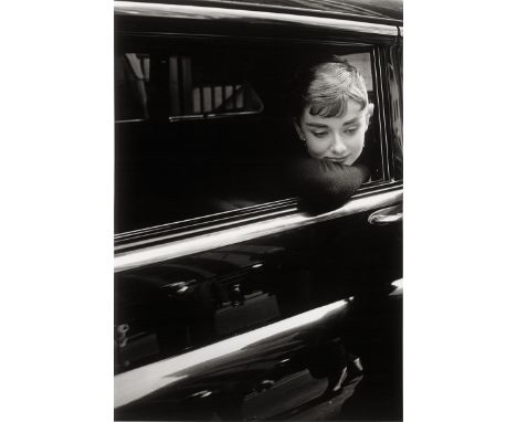 Stock, Dennis -- Audrey Hepburn during the filming of "Sabrina", directed by Billy Wilder. 1954/printed later. Gelatin silver