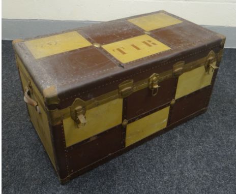 A VINTAGE CABIN TRUNK of checker design with initials, the interior with sectioned lift out compartments Provenance: The Esta