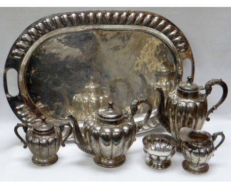 A MEXICAN SILVER SIX PIECE TEASET comprising oval tray, teapot, hot-water jug, sugar basin, lidded sucrier, cream-jug, marked