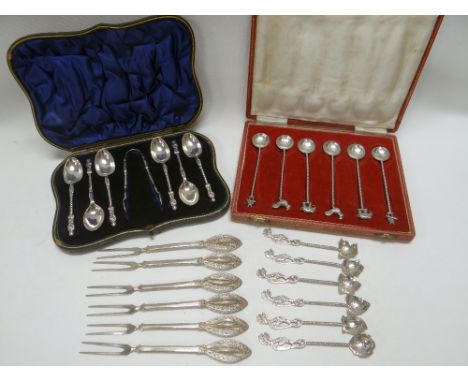 A CASED SILVER APOSTLE SPOON & TONG SET, A VICTORIAN RUPEE-SPOON SET and a parcel of continental silver flatware