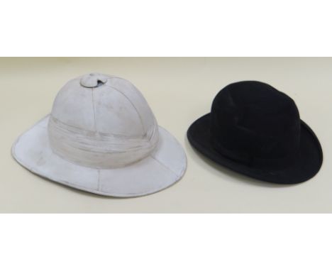 A CHRISTY'S LONDON BOWLER HAT & A COLONIAL PITH HELMET Provenance: The Estate of Thomas Ifor Rees, the first British Ambassad
