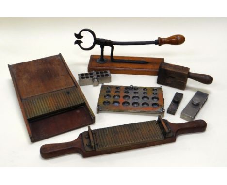 A PARCEL OF VINTAGE PHARMACEUTICAL APPARATUS including pill cachets, pill roller, cutter etc
