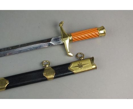 A rare Ukrainian Naval Dagger, Cold War era, with amber celluloid grip, unmarked blade 23cm, press-catch release function to 