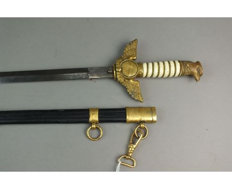 A Brazilian Air Force dagger and scabbard, mid-20th century, the hilt decorated with bird and coat of arms of the Federative 