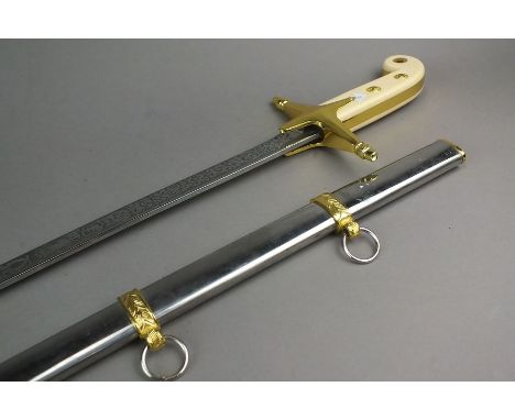 A modern U.S Marine sword and scabbard, overall length 91.5cm