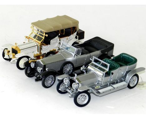 Franklin Mint 1/24 Rolls Royces: 1907 Silver Ghost 19.5cm long, in silver and chrome, 1911 Rolls Royce Tourer with canvas roo