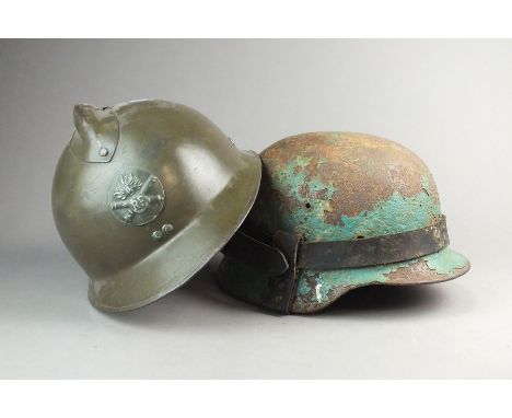 A WW2 French Adrian Pattern Steel Combat Helmet, helmet retaining nearly all of the original combat paint finish, with a Fren