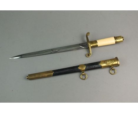 A M1952 Polish Navy Officer's Dagger, gilded hilt fittings with state insignia of a Polish Eagle to obverse, off-white plasti