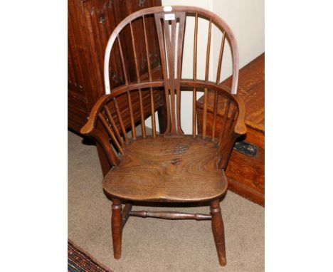 An Ash and Elm Windsor Armchair, mid 19th century, with double spindle back and pierced splat with outswept arms above a moul