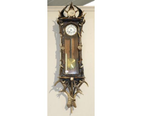 An Austro-German Antler Mounted Vienna Type Wall Timepiece, circa 1890, enamel dial, single weight driven movement, 115cm hig