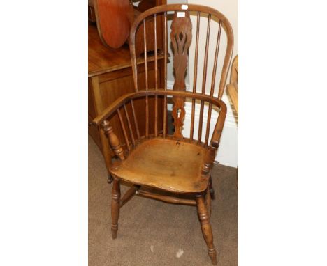 An Oak and Ash Windsor Armchair, mid 19th century, with double spindle back support and pierced splat above ring turned arm s