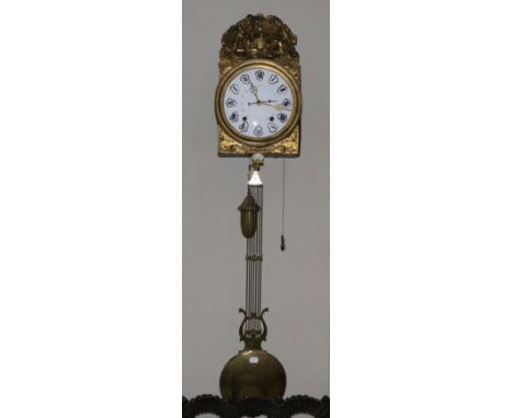 A French Comptoise Striking Wall Clock, late 19th century, brass embossed mounted fret, enamel plaque bearing a later signatu