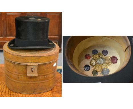 A 19th Century Eton College Students 'Pop' Black Silk Top Hat, with wax seals impressed with POP pressed to the inside, in ha