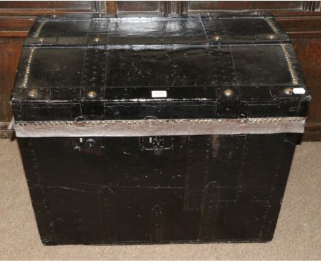 A Victorian Black Painted and Brass Close-Studded Dome Top Trunk, mid 19th century, with hinged lid enclosing a fabric interi