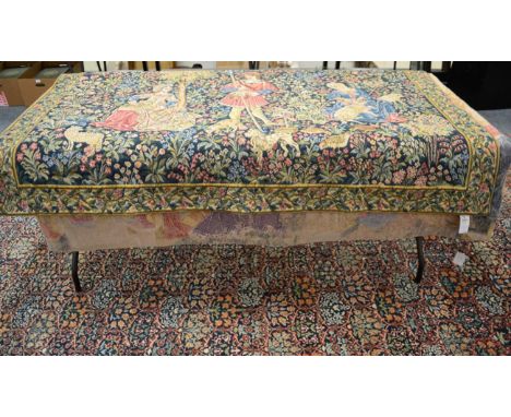 A Machine Made Tapestry of Medieval Design, 2nd half 20th century, the indigo ground with millefleur with three figures surro