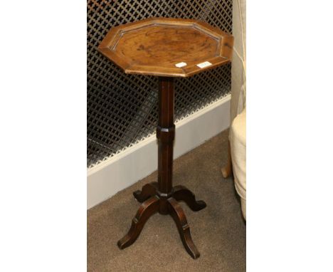 An Early 19th Century Fruitwood Tripod Table or Candle Stand, of octagonal shaped form, raised on a chamfered support with fo