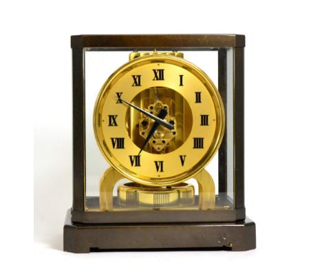 An Atmos Clock, signed Jaeger LeCoultre, No.7042, 20th century, 5-inch Roman numeral chapter ring, skeletonised centre, large