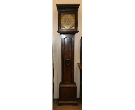 An Oak Eight Day Longcase Clock, signed Peter Hathornthwaite, Kirkby Lonsdale, circa 1720, flat top pediment, side viewing wi