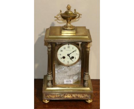 A Brass Four Glass Striking Mantel Clock, retailed by A.Frankfield & Co, New York, circa 1900, surmounted with an urn finial,