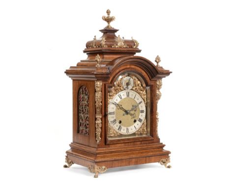 A Walnut Quarter Striking Table Clock, circa 1890, caddied pediment with gilt metal mounts, side sound frets, claw feet, silv