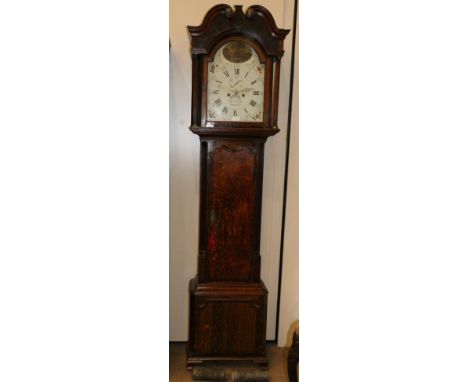 An Oak Eight Day Longcase Clock, signed Thos Twigg, Shelton, circa 1810, swan neck pediment, fluted pilasters, 13-inch arched