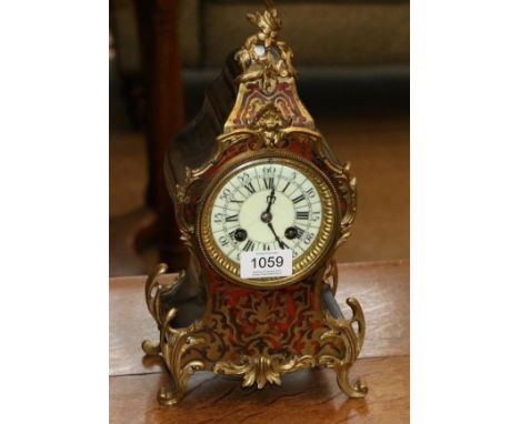 A ''Boulle'' Striking Mantel Clock, circa 1910, scroll gilt metal mounts, enamel dial, twin barrel movement striking on a gon