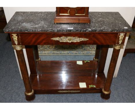 A Regency Mahogany and Gilt Metal Mounted Console Table, early 19th century, with a grey and white rectangular marble top abo