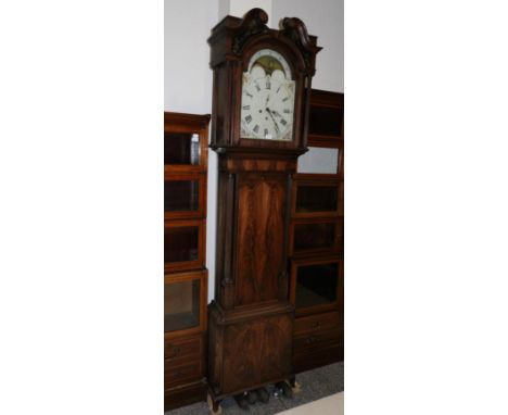 A Mahogany Eight Day Longcase Clock, circa 1810, swan neck pediment, six column hood with painted glass panels, triple arched