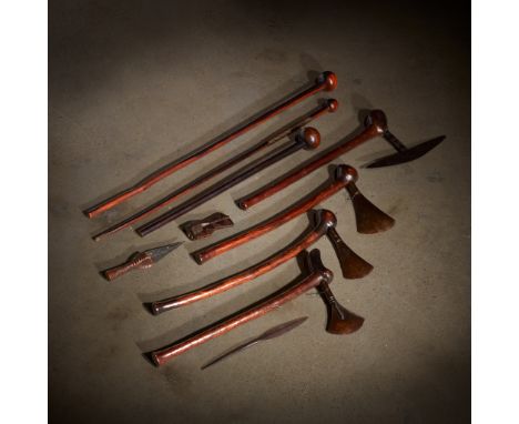 A collection of Zulu weapons 19th century Comprising four axes, three knobkerries (clubs), a spear head and a small dagger, a