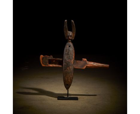 A Bamana door lock Mali Carved wood, with stylised head finial and horned crest, dark encrusted patina, raised on a bespoke m