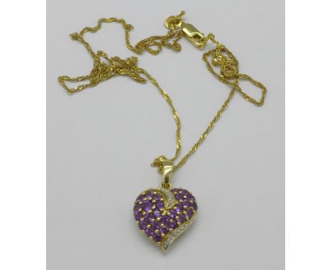 A 9ct gold, amethyst and diamond pendant on a 14ct gold chain, 3g, (1.7 + 1.3)