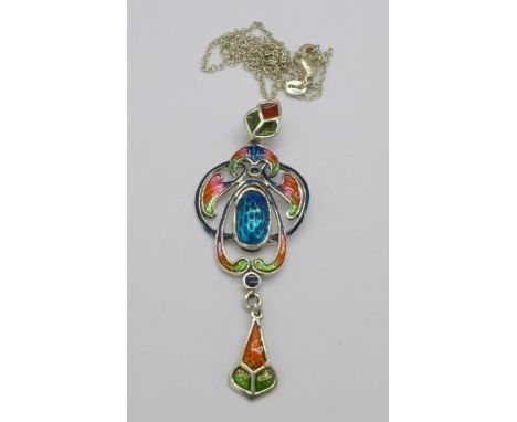 A silver and enamel Art Nouveau style pendant and chain