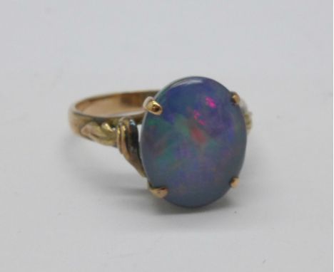 A 14ct gold and opal doublet ring, 2.4g, M