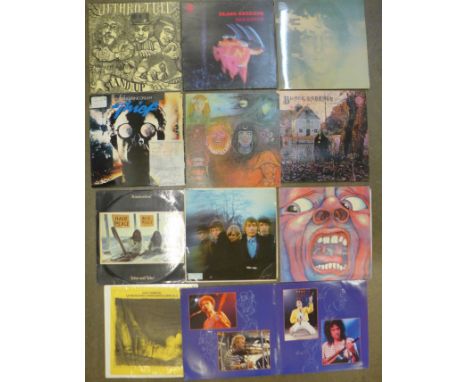 Eleven LP records, Rolling Stones, Black Sabbath, Queen, King Crimson, John & Yoko, etc.